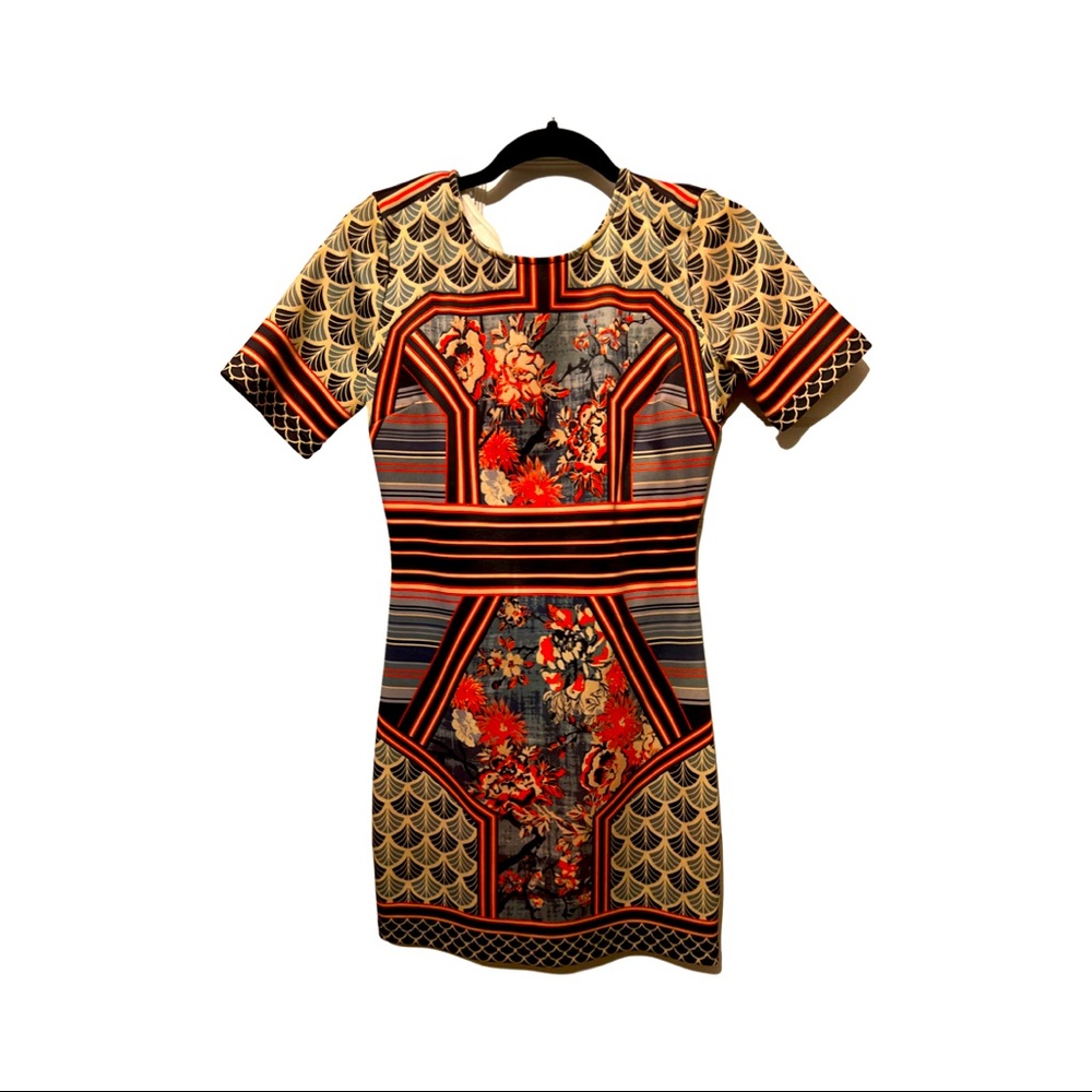 Fun dress with patterns and flowers good condition
